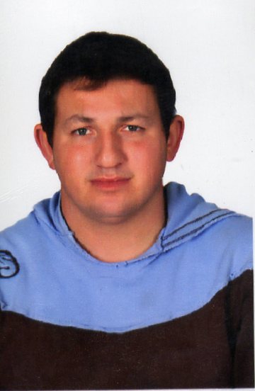 ÖZCAN  AK